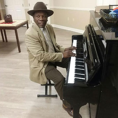 Resident playing piano